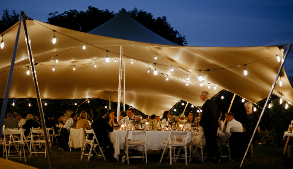 Outdoor marquee at Château de Bois Rigaud, a small and beautiful wedding venue in the French countryside