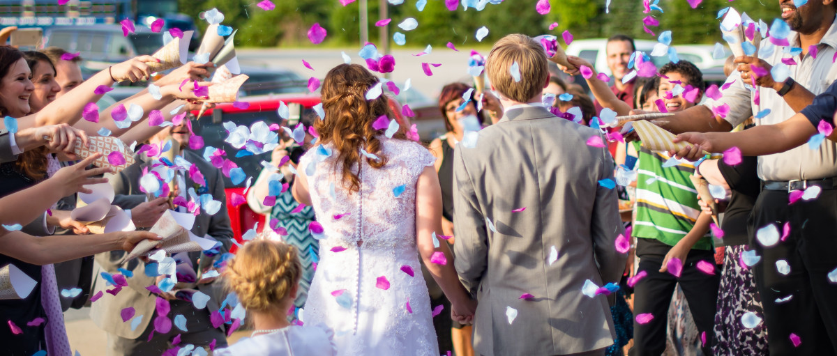 Guests celebrating a wedding in France with the bride and the groom