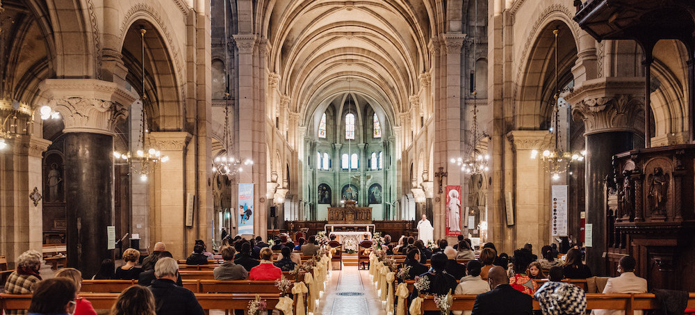 A religious wedding ceremony taking place in a French church