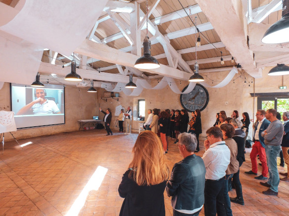 People stanting at a business meeting organized in château de Bois Rigaud